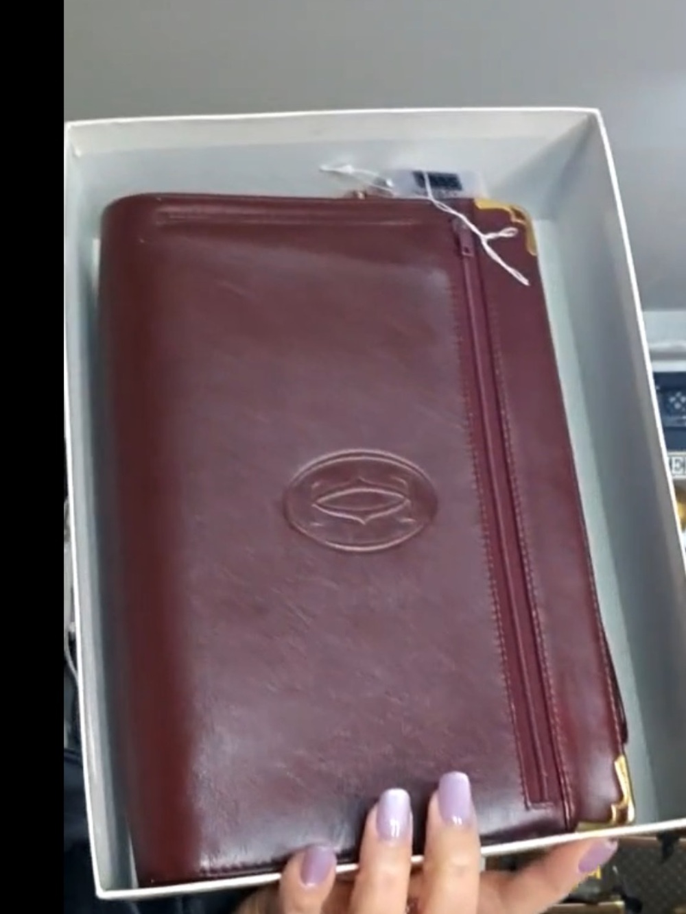 CARTIER Leather Zip-Front and middle Clutch Burgundy